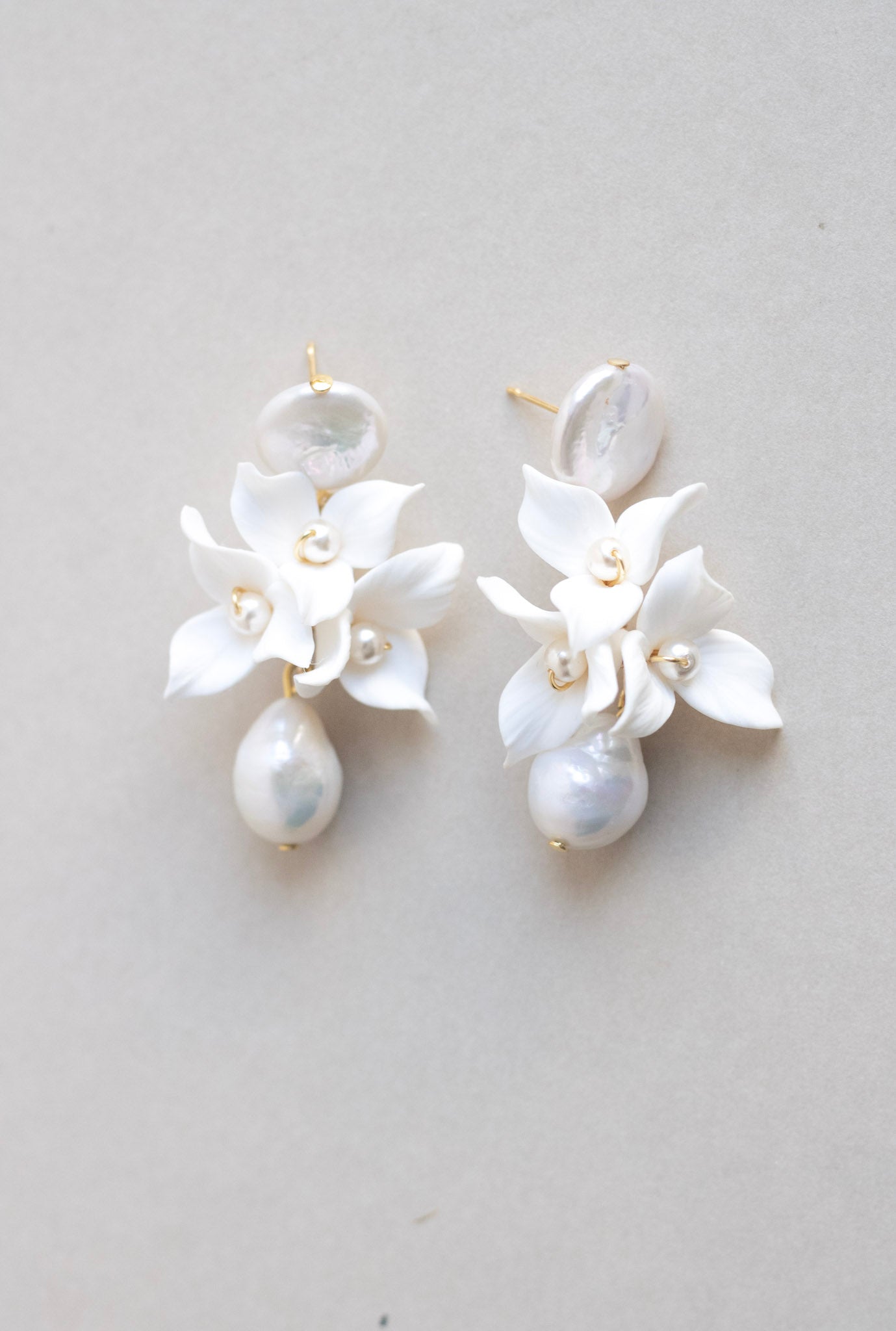 flower clay and pearl bridal earrings by megan therese