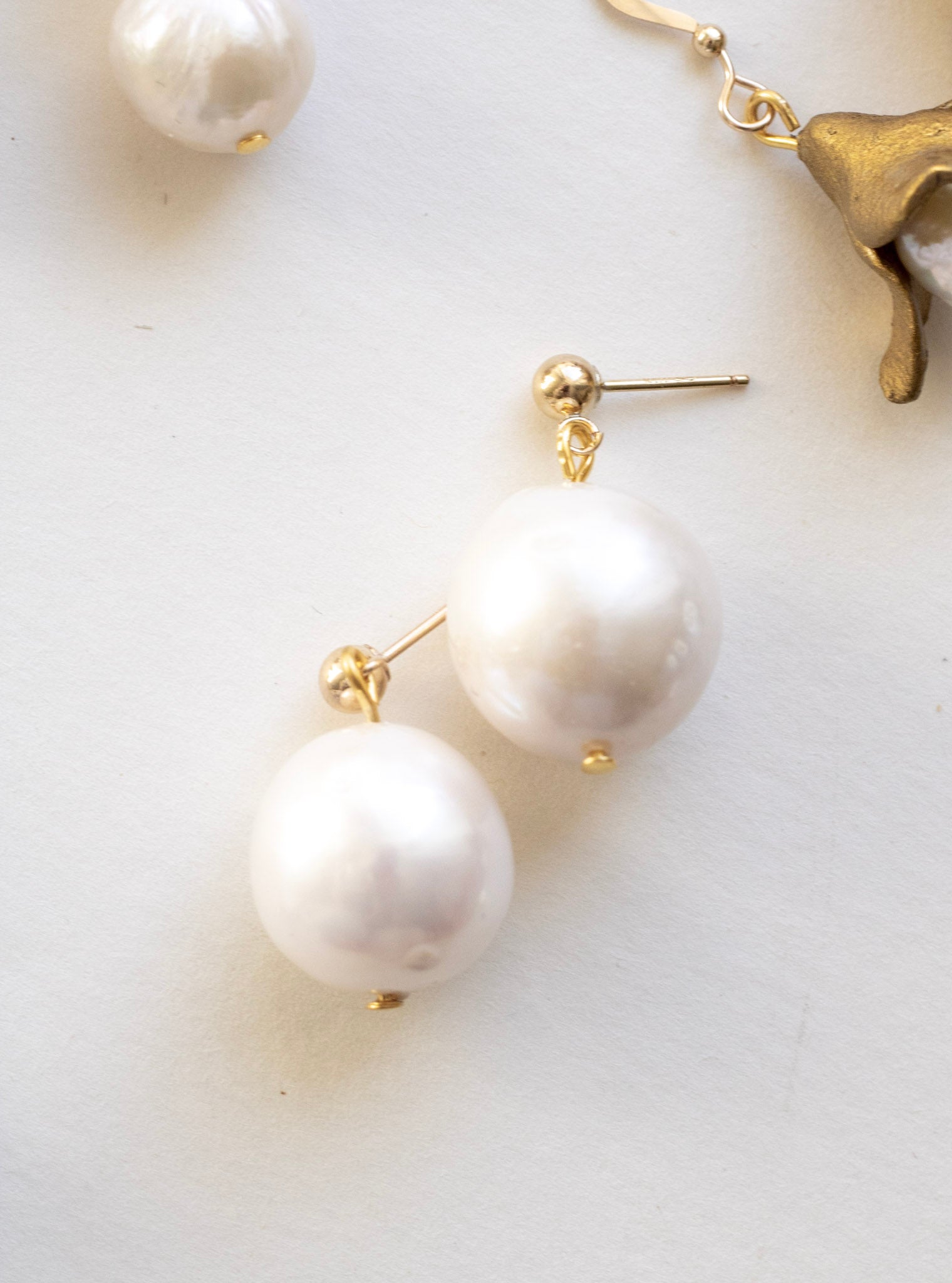 luxury baroque pearl earrings by megan therese