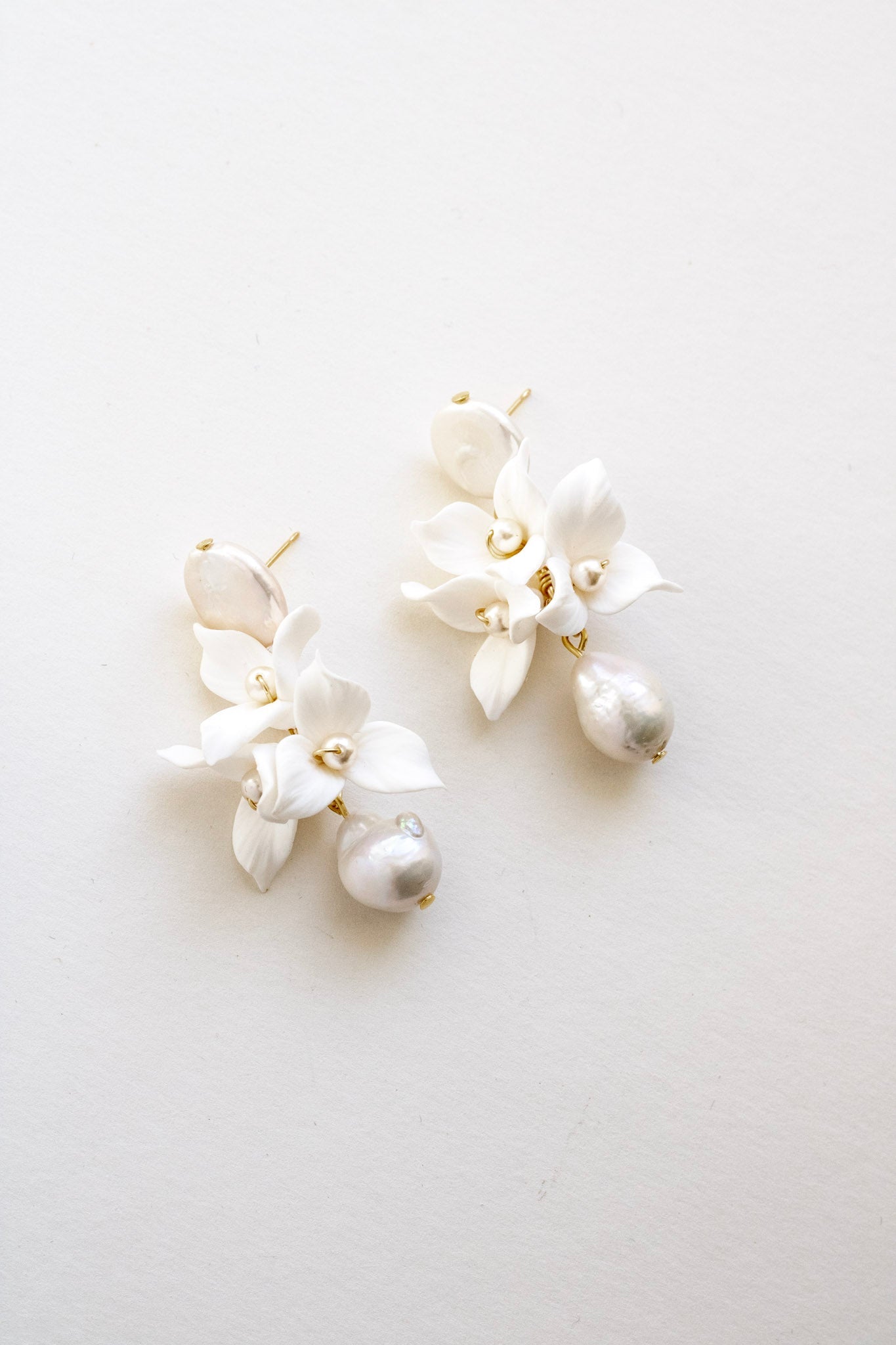 flower clay and pearl bridal earrings by megan therese