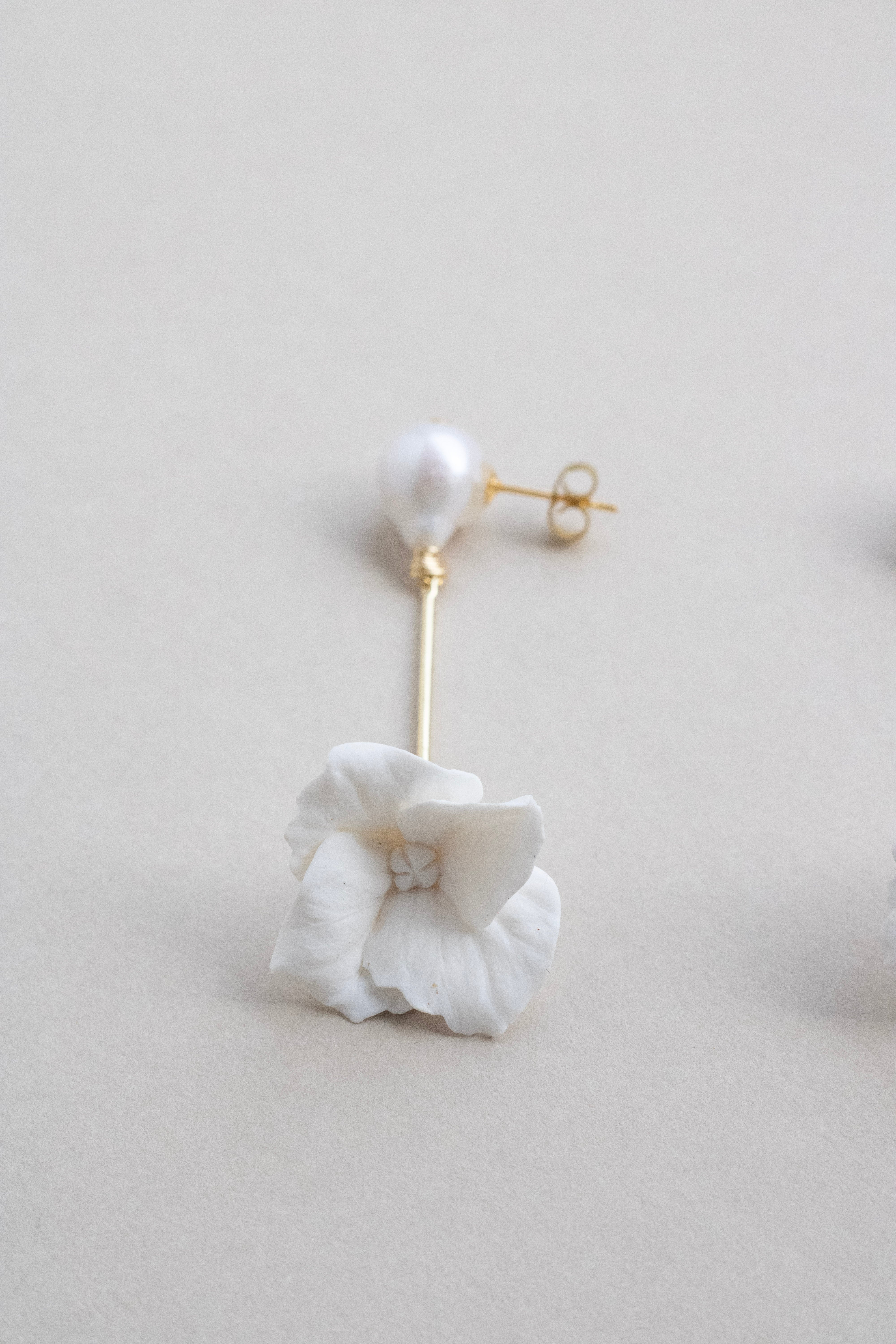 Pearl and clay flower drop earrings by megan therese