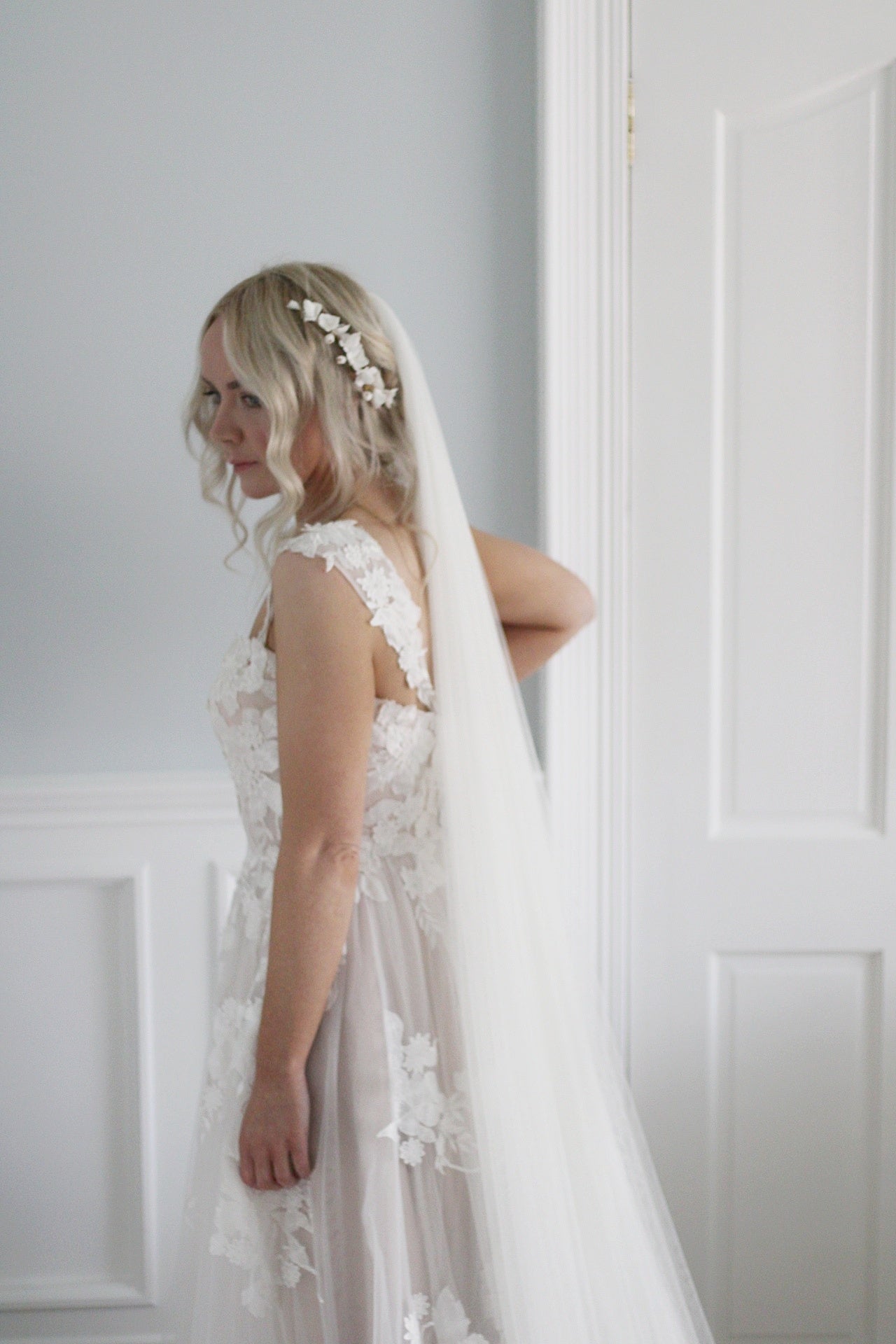 handcrafted clay flower wedding headpiece and soft veil  by megan therese