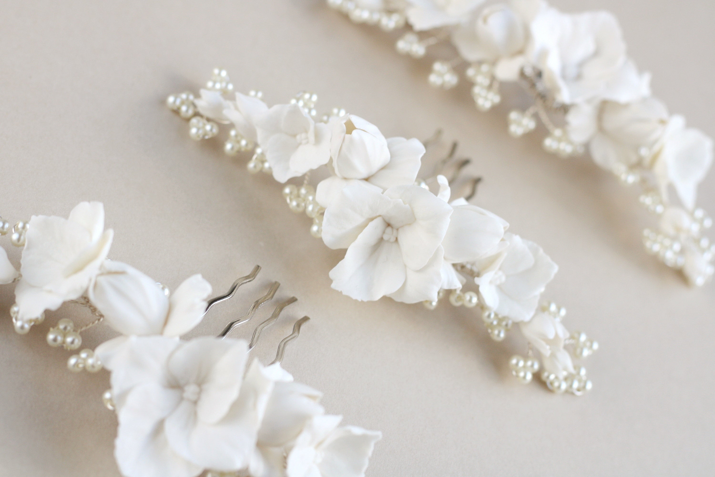 bridal accessories made from clay flowers and pearls by megan therese