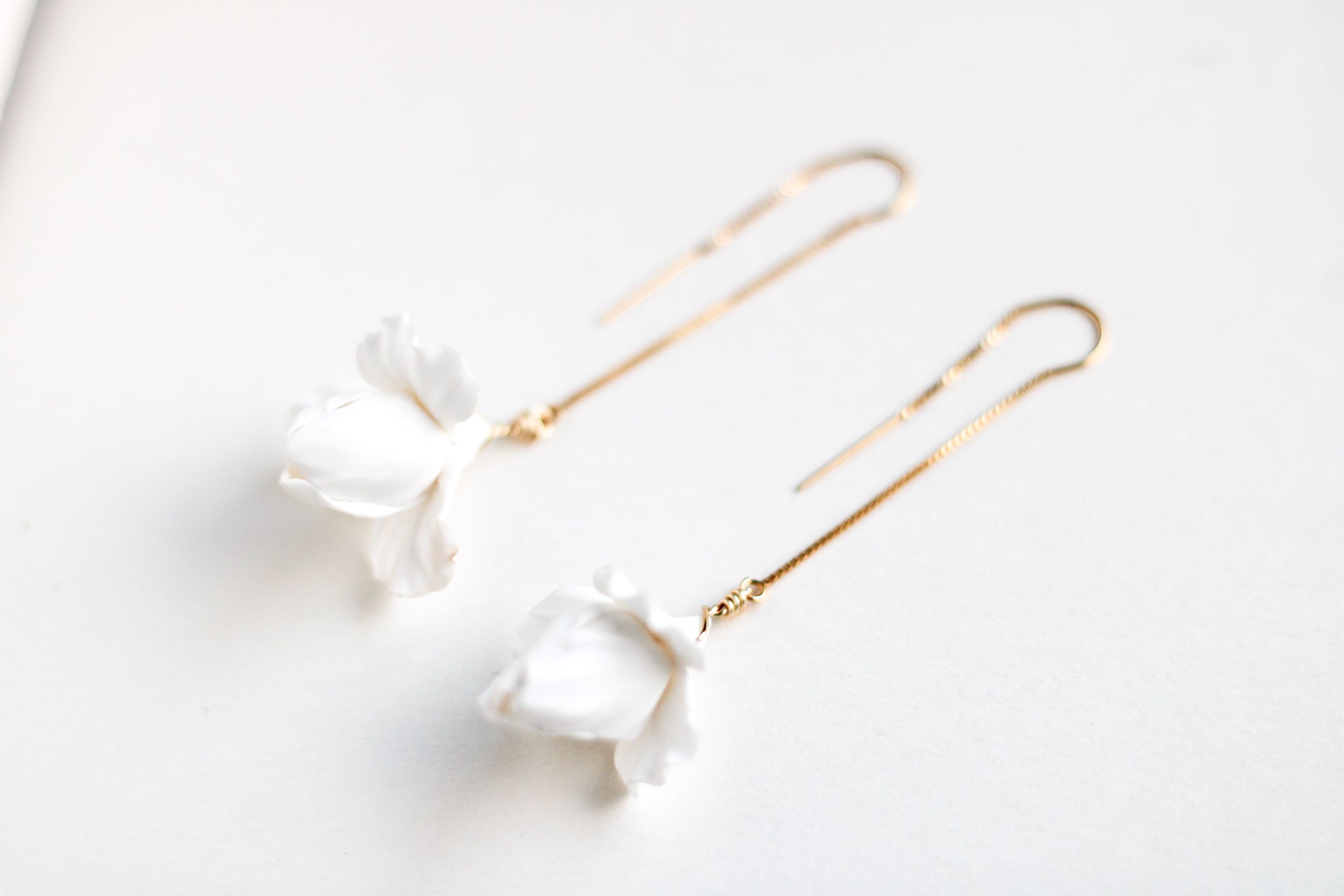 delicate minimal bridal drop earring by megan therese