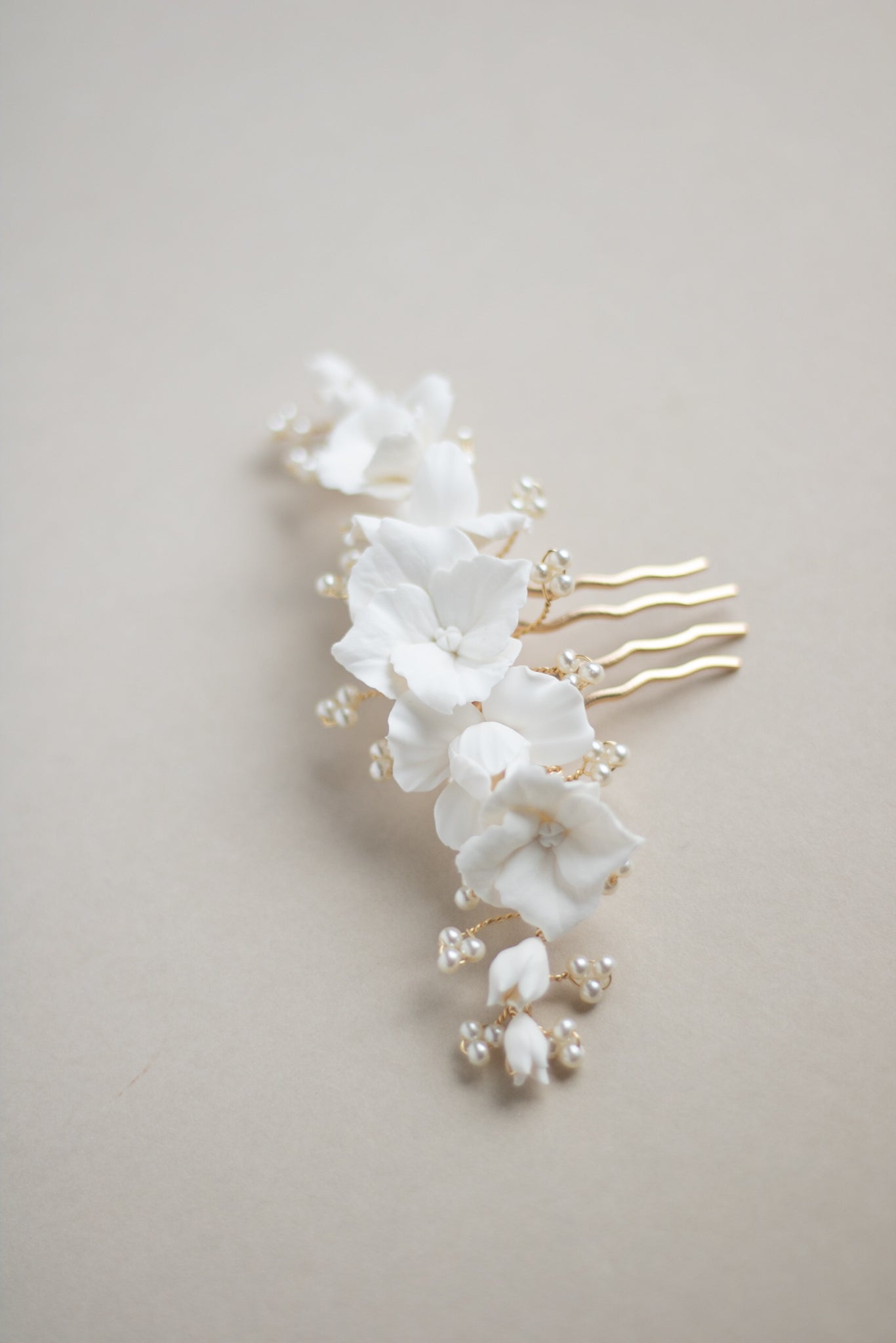 clay and pearl bridal hair comb by megan therese