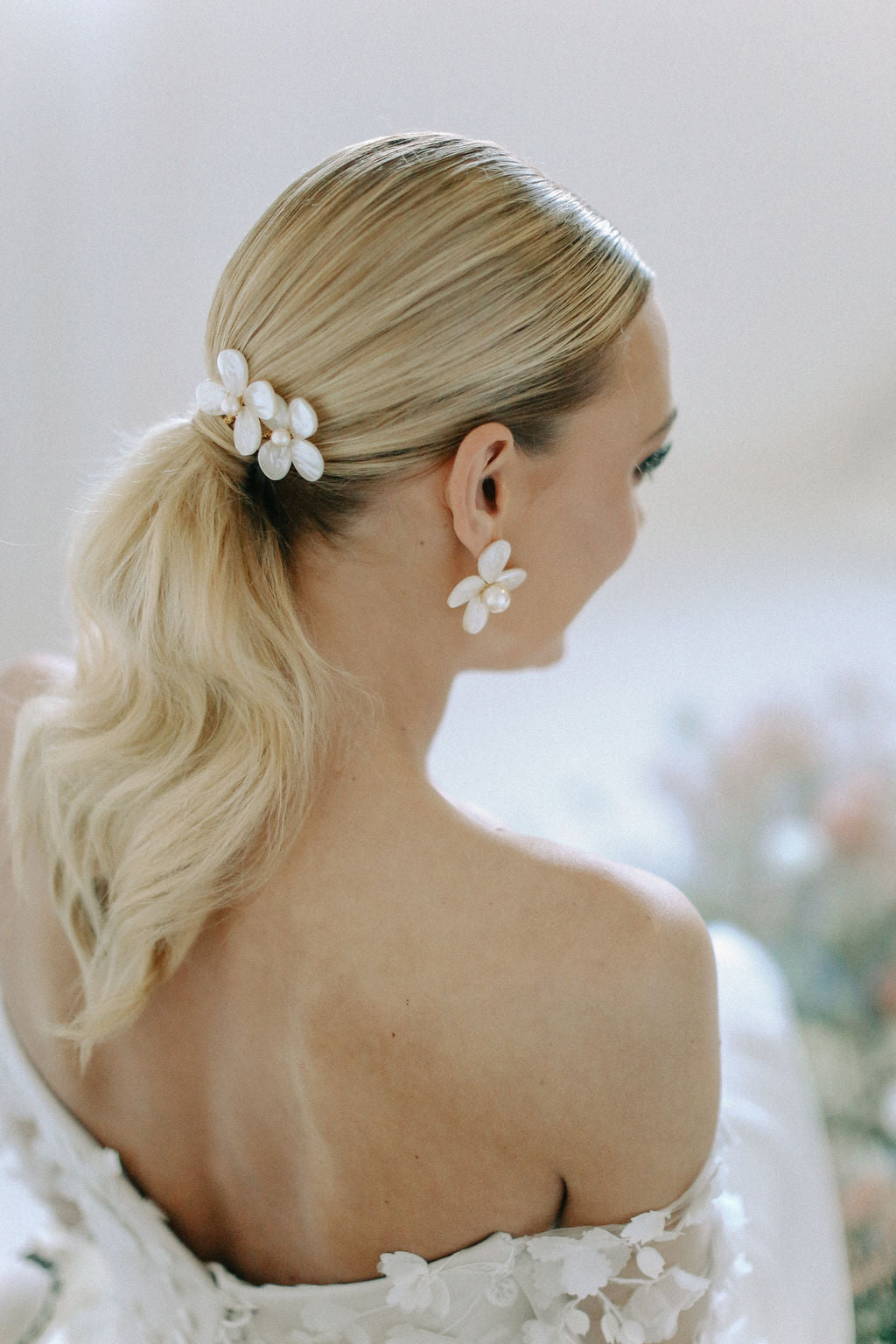 bridal ponytail with hair pins by megan therese